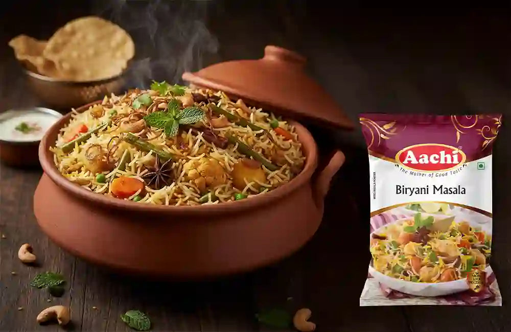 Aromatic biryani masala spices like cinnamon, cloves, and star anise adding flavour to traditional biryani.